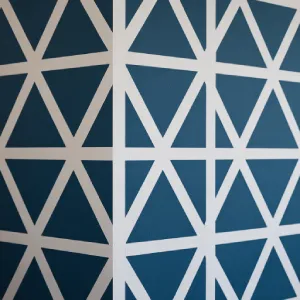 Custom stencil pattern on feature wall